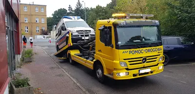 Pomoc drogowa Bogumił Kuś autoholowanie laweta Szczecin 24H ADAC Kołbaskowo Transport